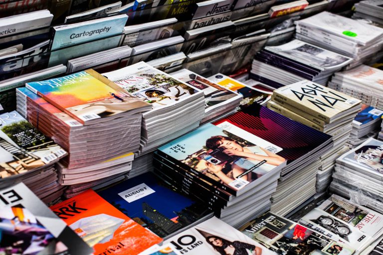 Piles of magazines at store