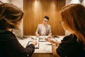 Business people sitting around a desk