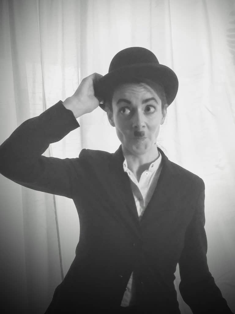 Photo of co-editor Janet Mowat dressed as Chaplin or maybe she just looks like that