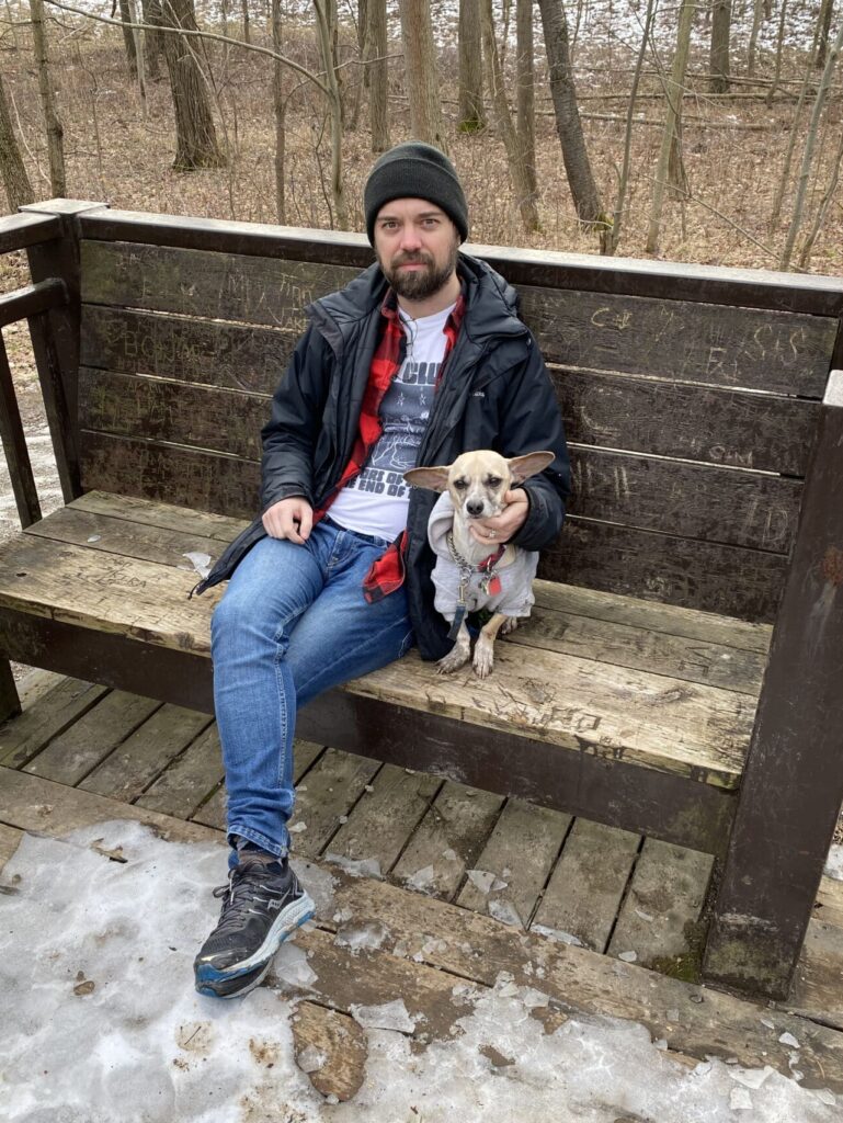 Photo of co-editor, Sam Allemang, and co-editor’s dog, Hector