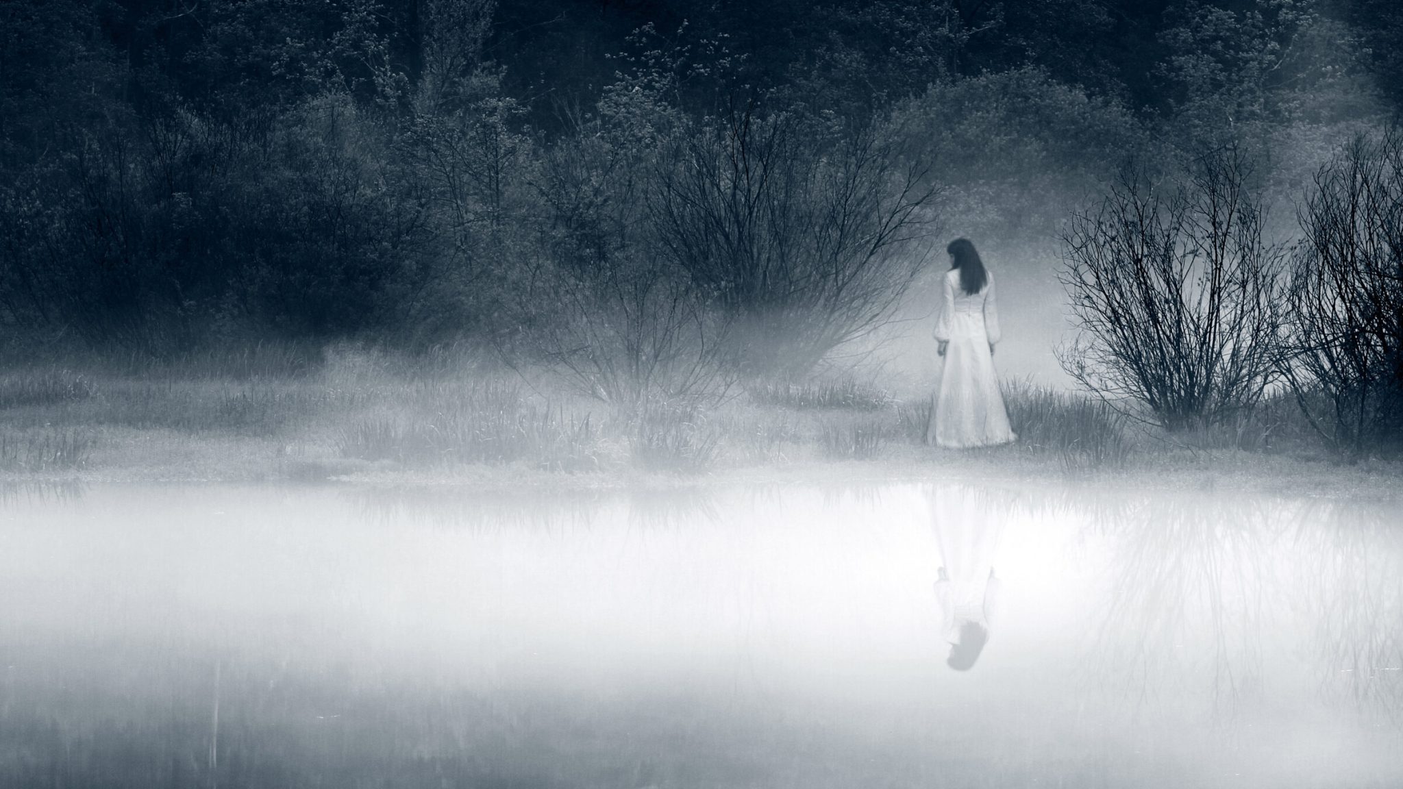 Lady at the lake, vintage filter - horror scene
