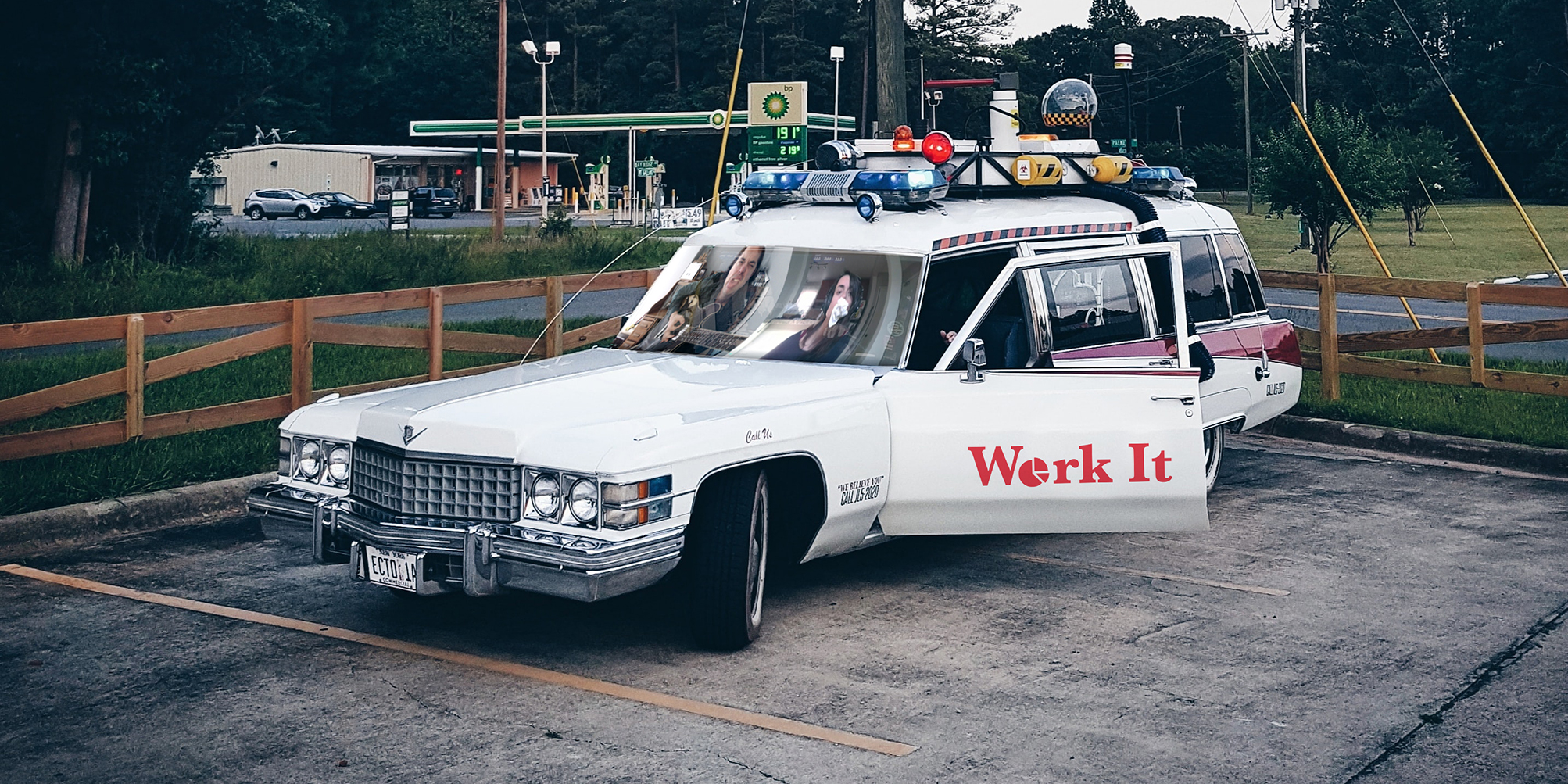 The car from Ghostbusters, with Sam and Janet Photoshopped into the window and a Work It decal on the site