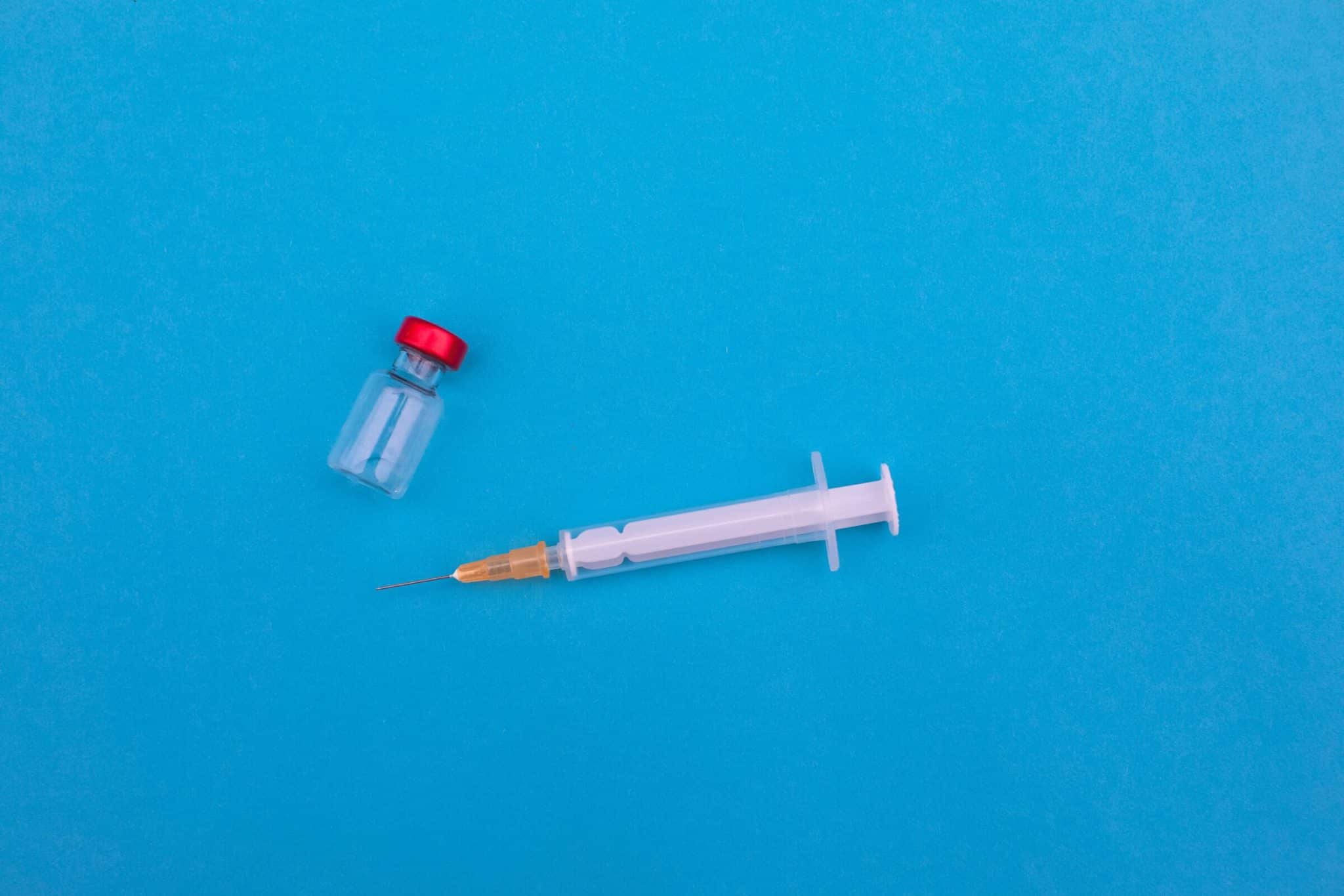 A needle and dose of vaccine