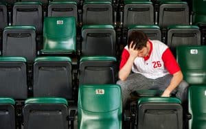 Fans: Man Sits Alone After Losing