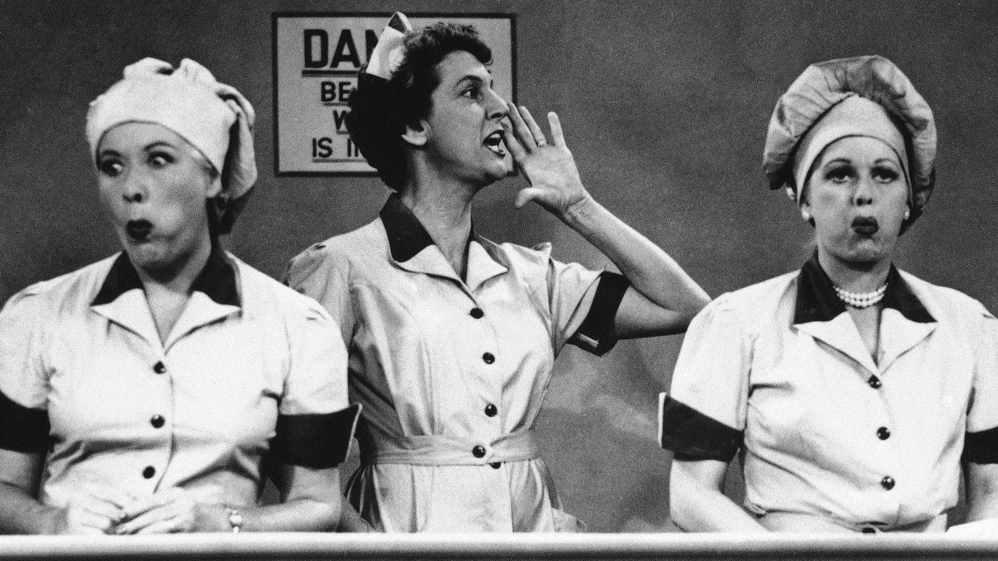 Vivian Vance and Lucille Ball ham it up at the chocolate factory in a famous food-centric episode of "I Love Lucy."