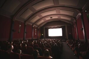 People sitting in a movie theatre